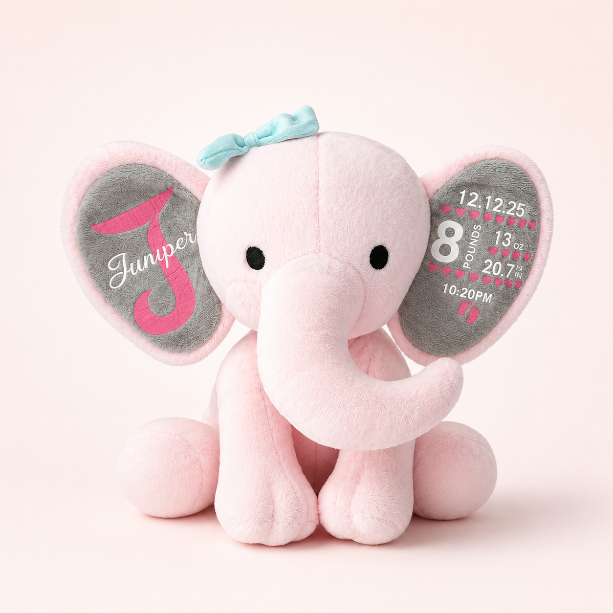 Pink elephant plush personalized with baby name and birth stats