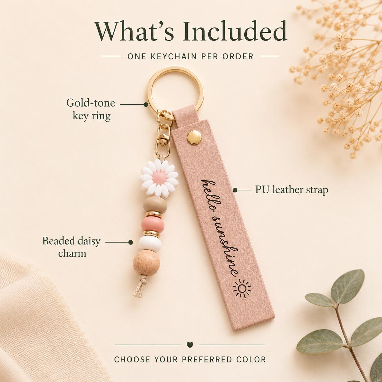 Close up of daisy charm and gold hardware