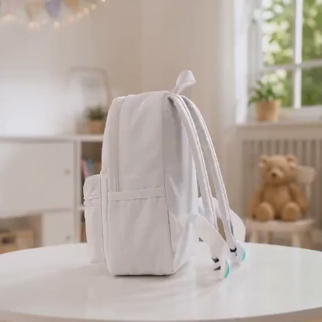Personalized kids activity backpack shown with the activities and toys inside